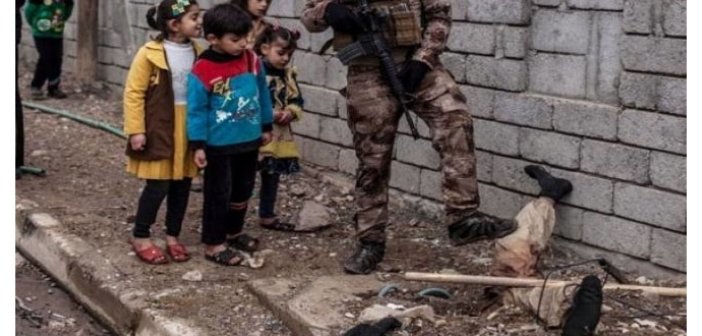 İŞİD-çini öldürüb başıaşağı basdırdılar - Foto